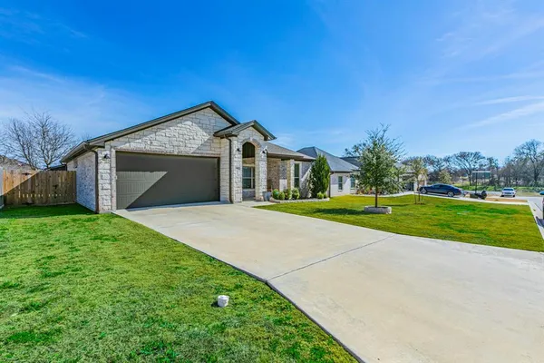 a view of a house with garden