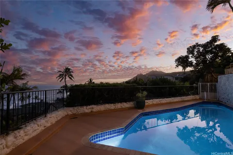 a view of a balcony with a lake view