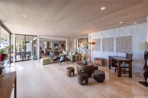 a living room with furniture and a table