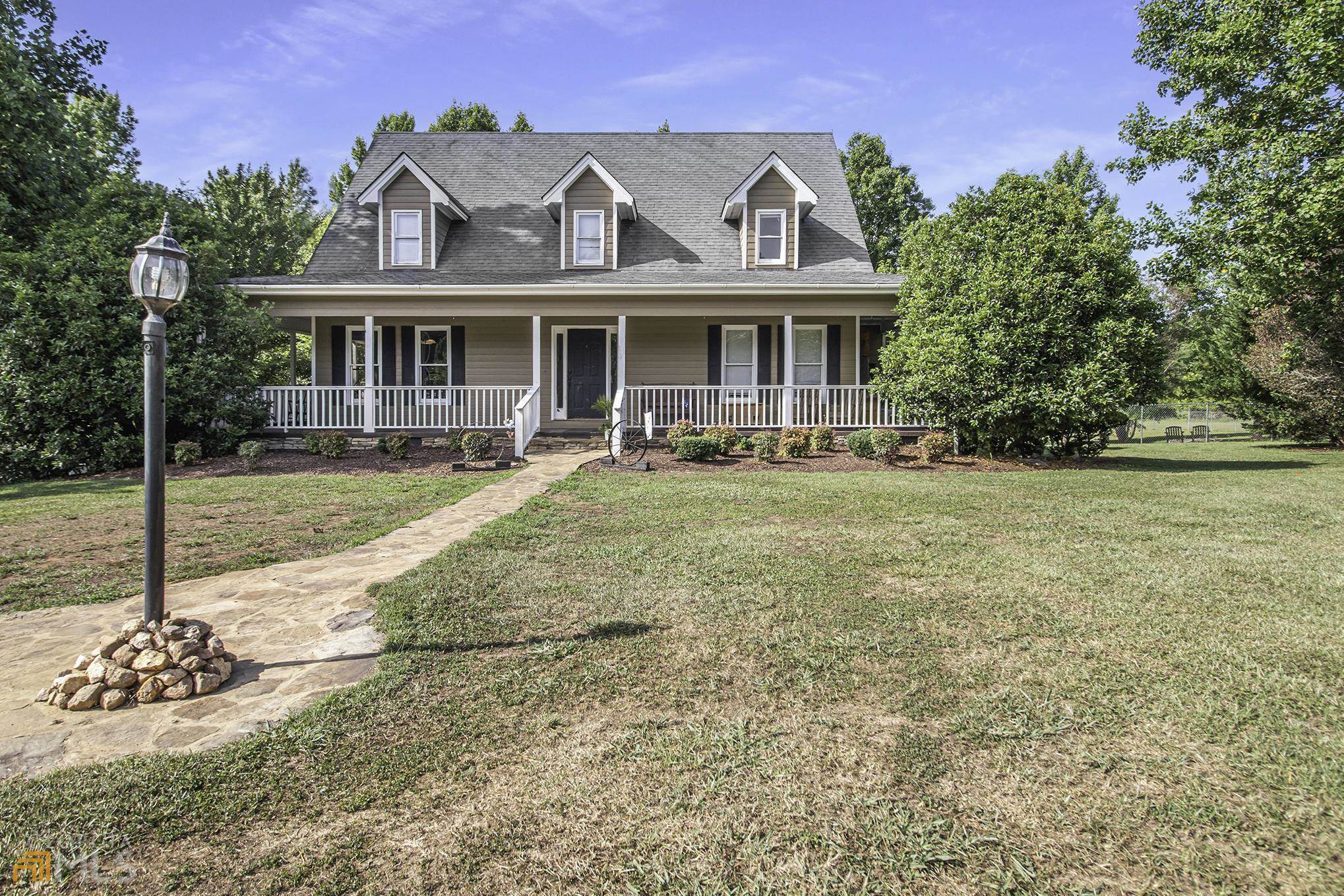 85 Barker Road Thomaston, GA 30286 - Photo 1 of 1 a front view of a house with a yard