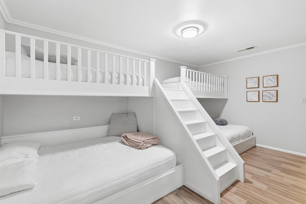 4433 Chapel Road Graham, TX 76450 - Photo 29 of 32 a bedroom with a bed and a window