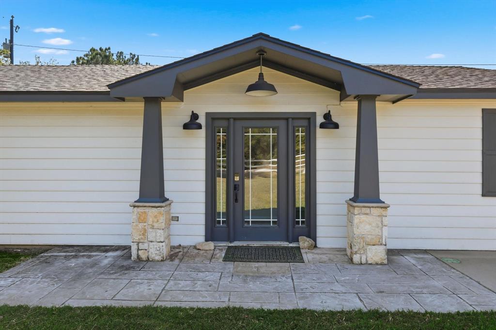 4433 Chapel Road Graham, TX 76450 - Photo 31 of 32 a front view of a house with garden
