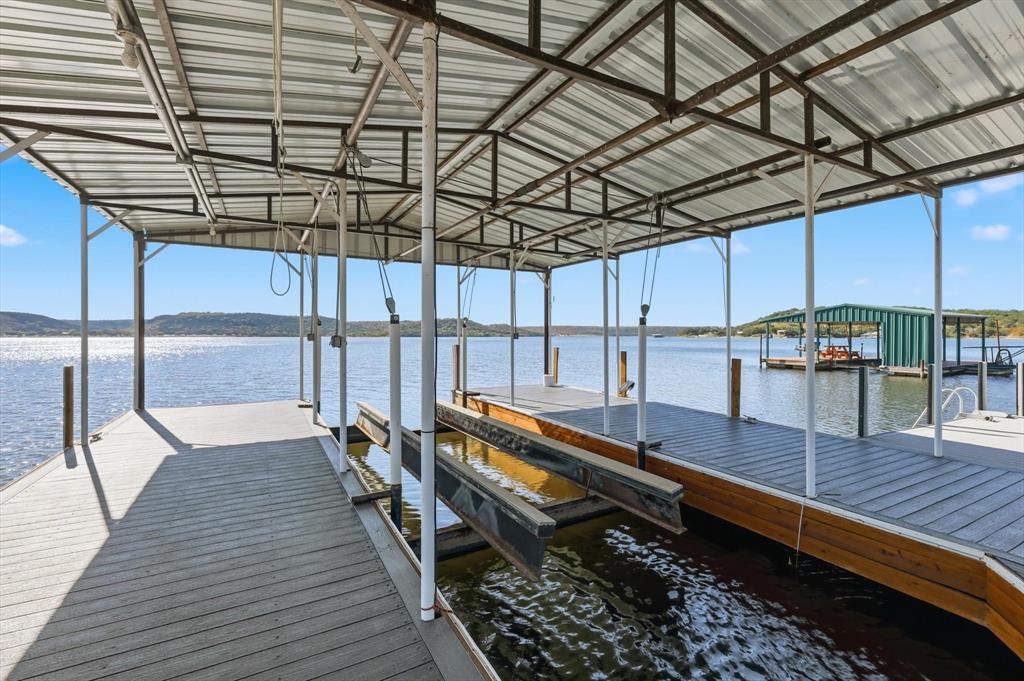 4433 Chapel Road Graham, TX 76450 - Photo 6 of 32 a view of a patio with a table and chairs