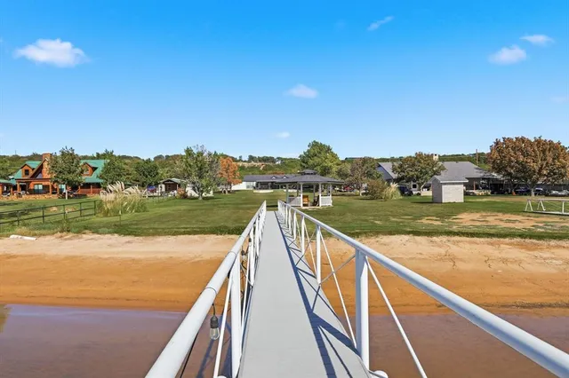 a view of swimming pool with a lake