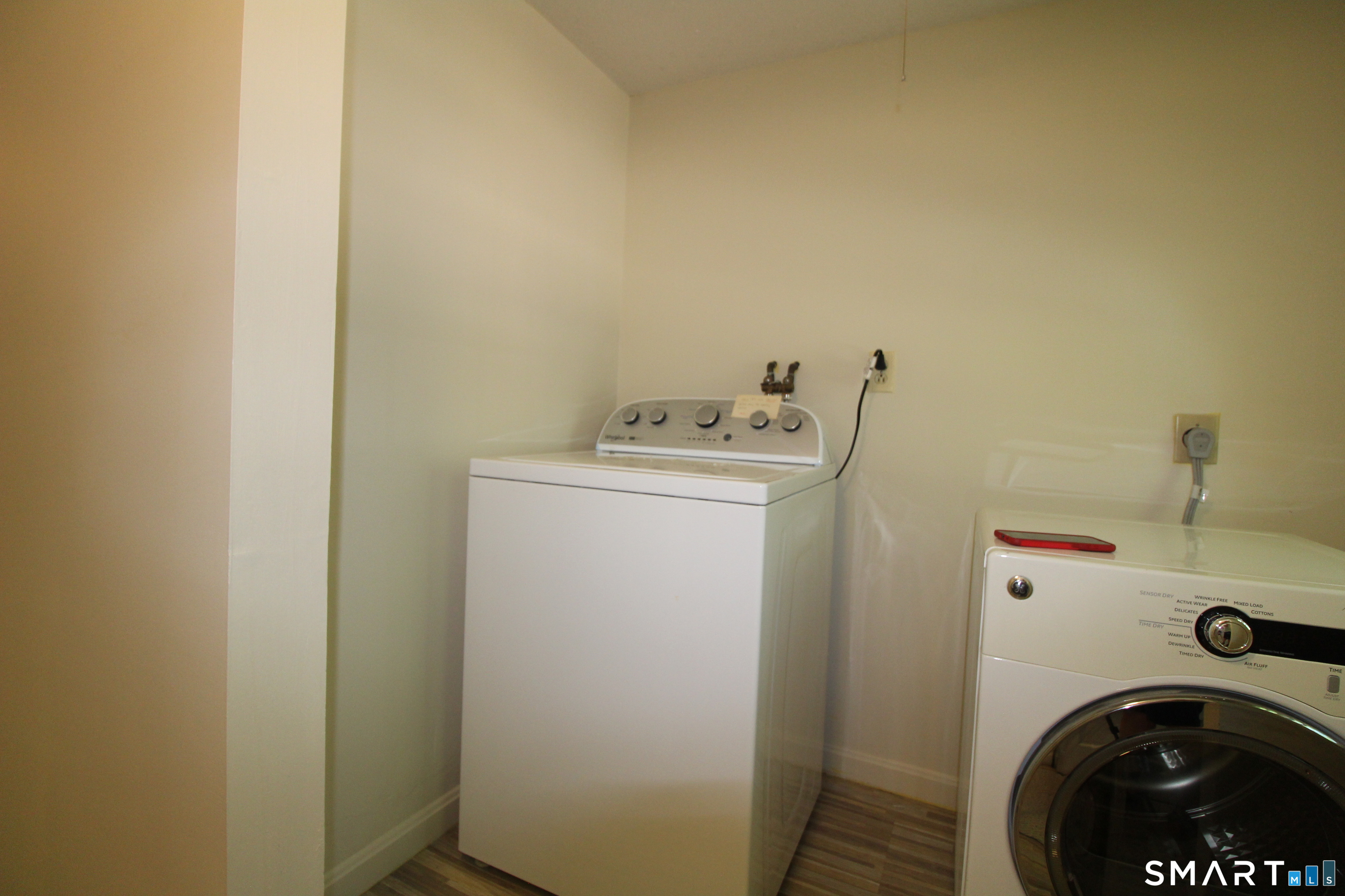 67 Mulberry Road Mansfield, CT 06250 - Photo 24 of 27 Downstairs laundry with new flooring