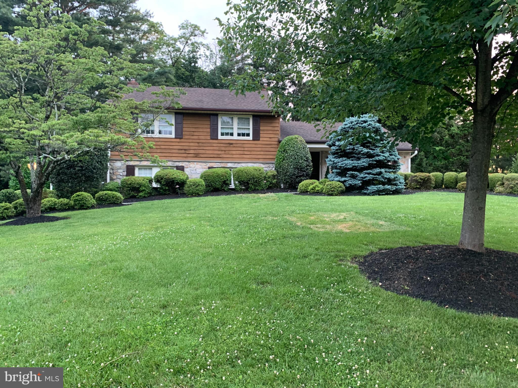 2209 North Stone Ridge Lane Villanova, PA 19085 - Photo 1 of 29 a front view of a house with a yard