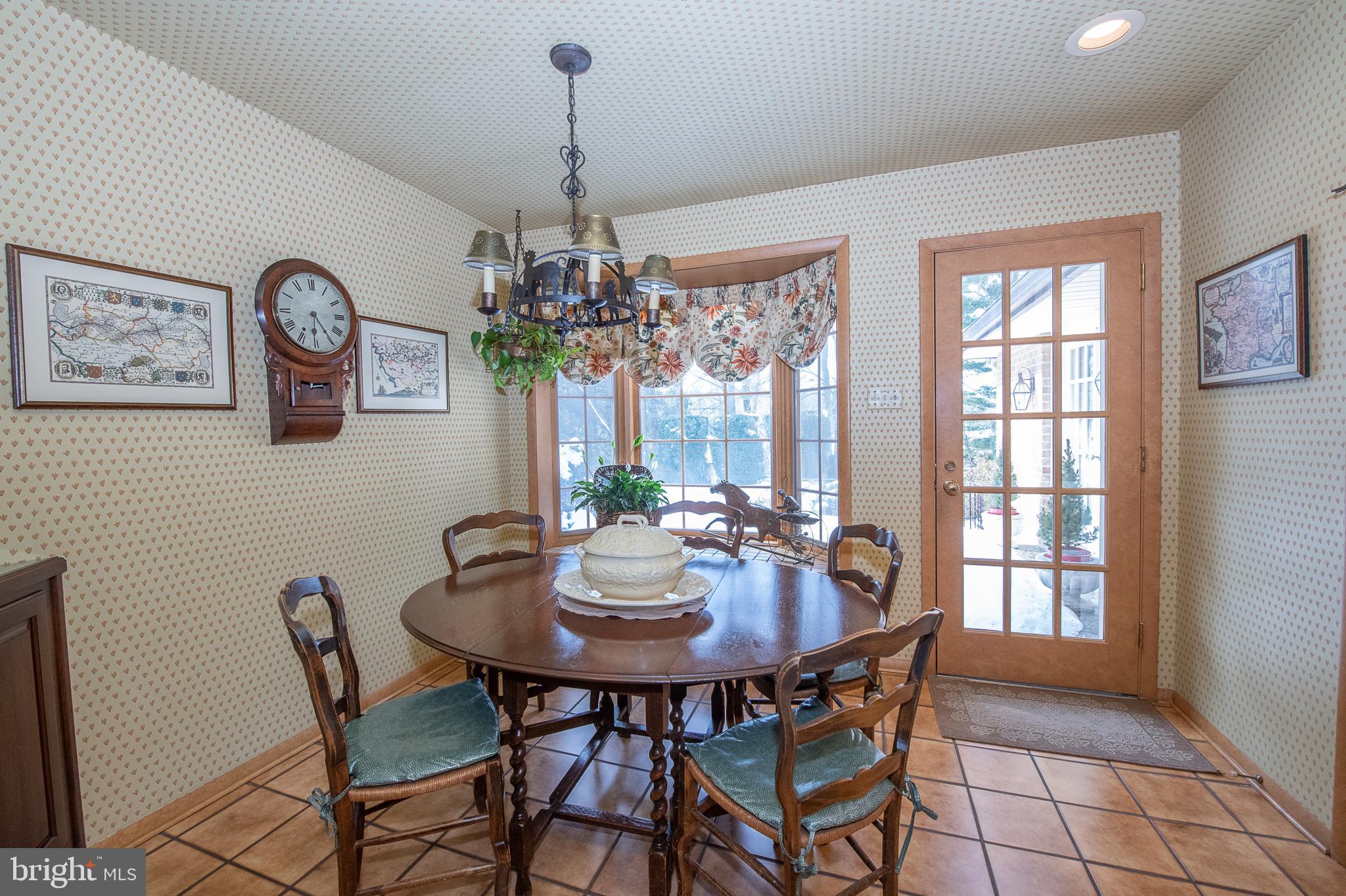 2209 North Stone Ridge Lane Villanova, PA 19085 - Photo 13 of 29 a view of a dining room and a chandelier