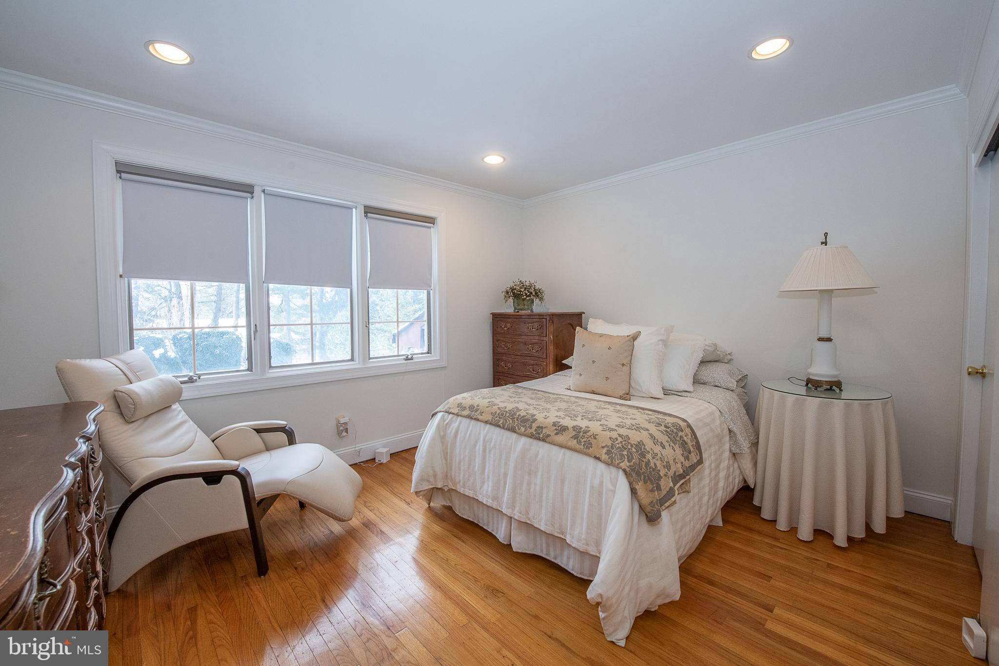 2209 North Stone Ridge Lane Villanova, PA 19085 - Photo 17 of 29 a bedroom with a bed and wooden floor