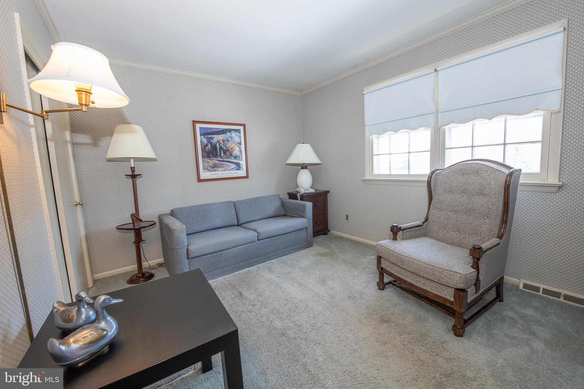 2209 North Stone Ridge Lane Villanova, PA 19085 - Photo 18 of 29 a living room with furniture and a window
