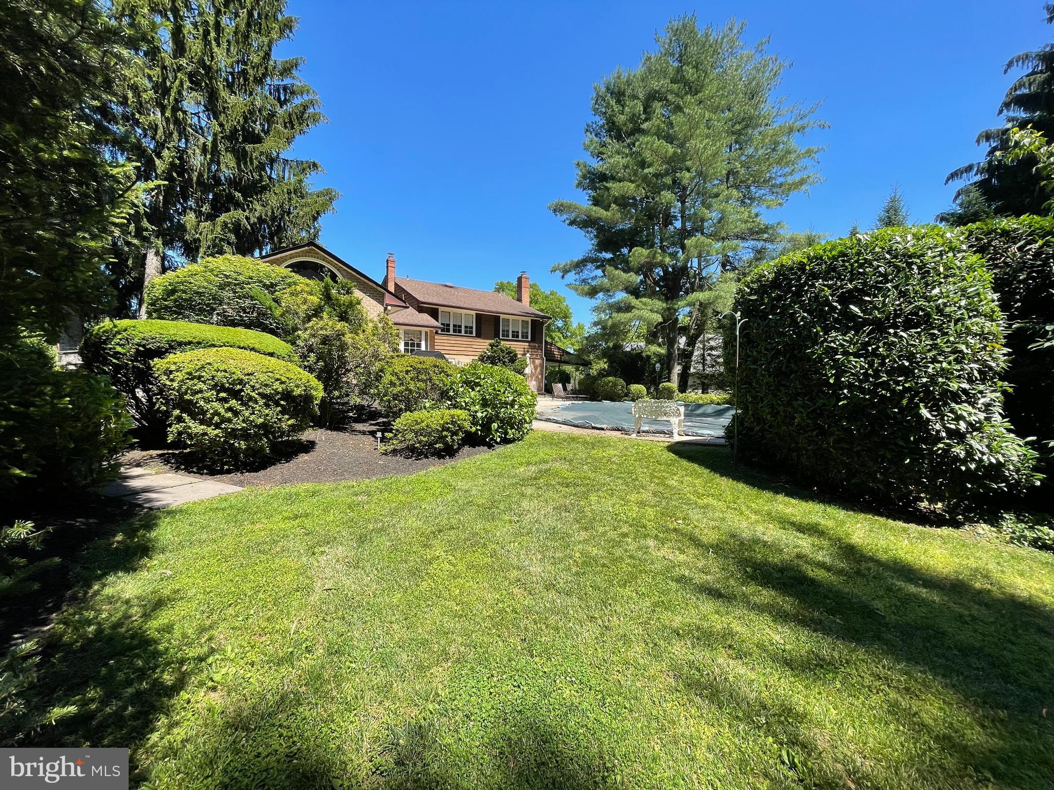 2209 North Stone Ridge Lane Villanova, PA 19085 - Photo 28 of 29 a view of a garden with a pathway
