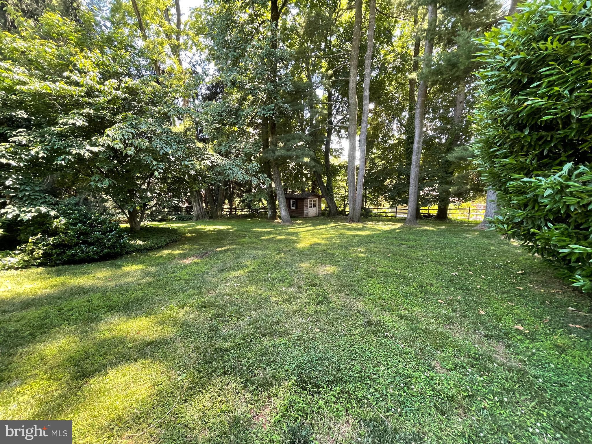 2209 North Stone Ridge Lane Villanova, PA 19085 - Photo 29 of 29 a big yard with trees in the background