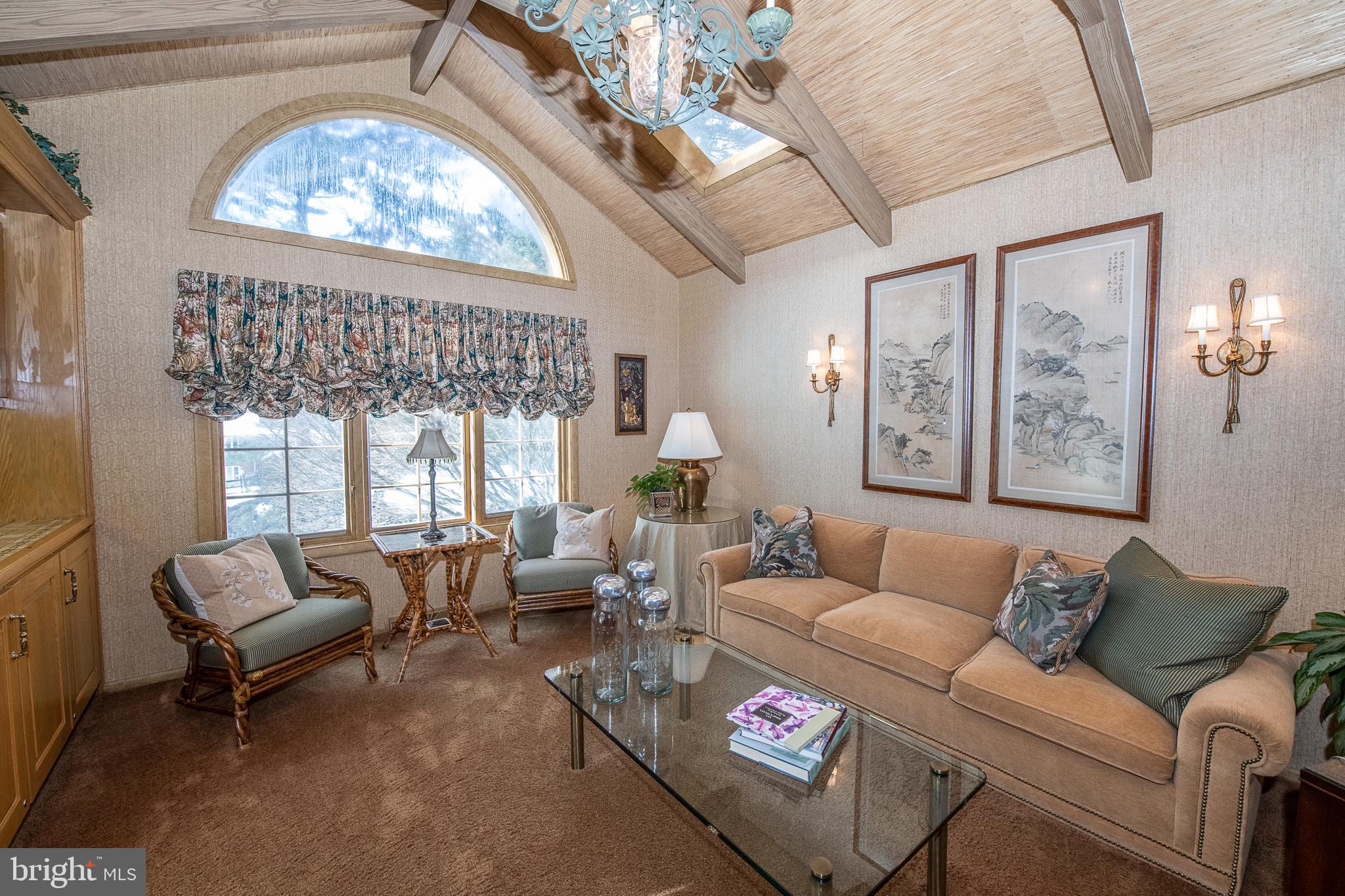 2209 North Stone Ridge Lane Villanova, PA 19085 - Photo 8 of 29 a living room with furniture and a large window