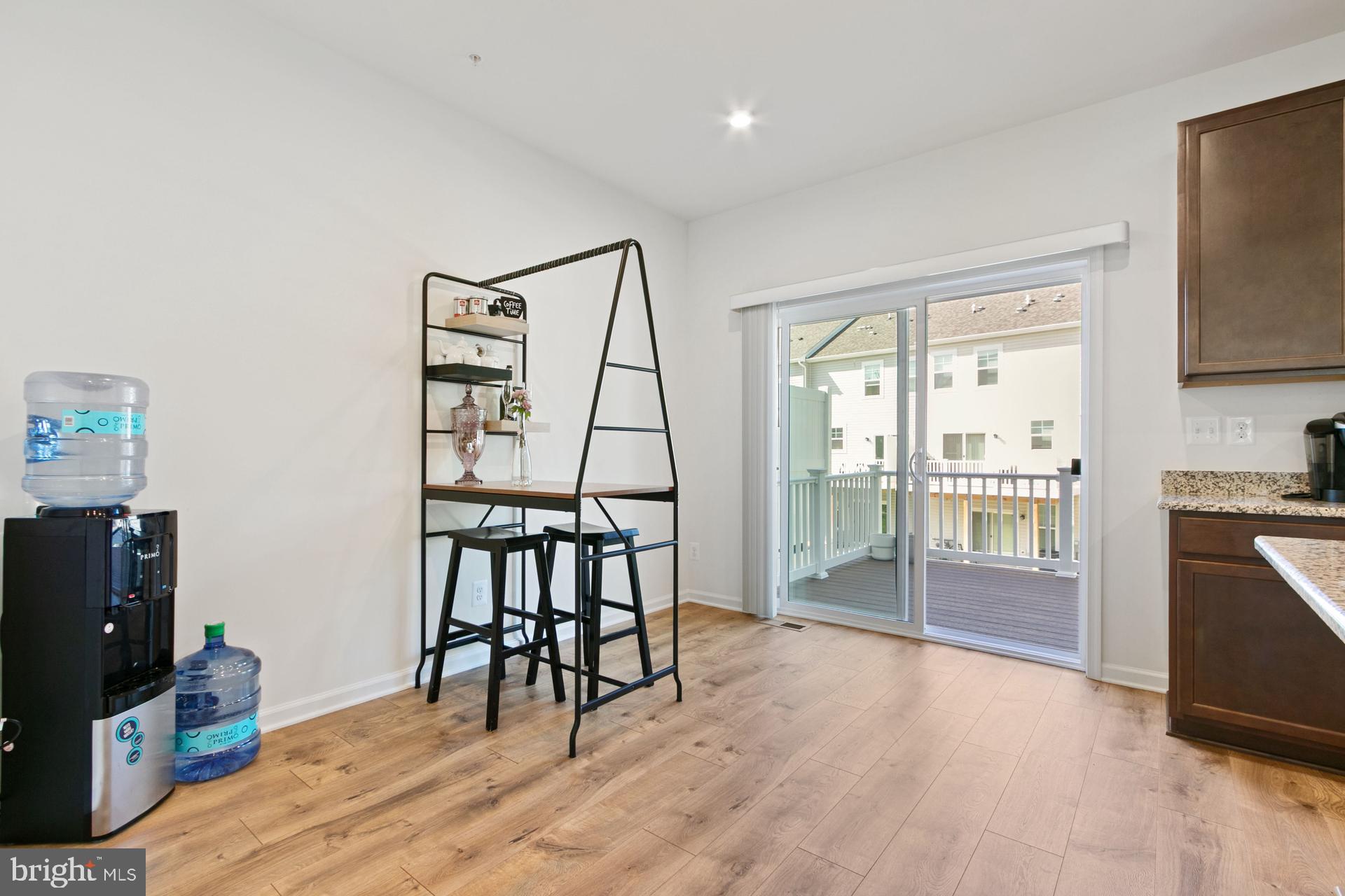 340 Shipyard Drive Cambridge, MD 21613 - Photo 13 of 35 a view of a livingroom with furniture and a flat screen tv