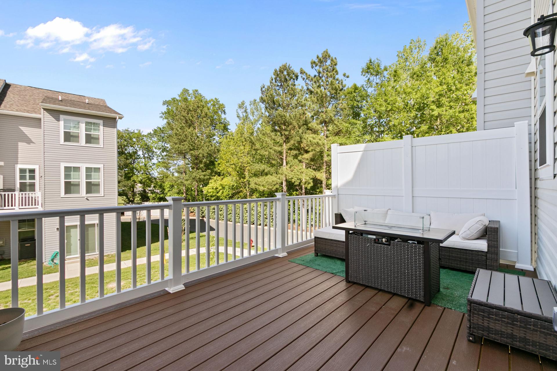 340 Shipyard Drive Cambridge, MD 21613 - Photo 15 of 35 a view of a roof deck with wooden floor and fence