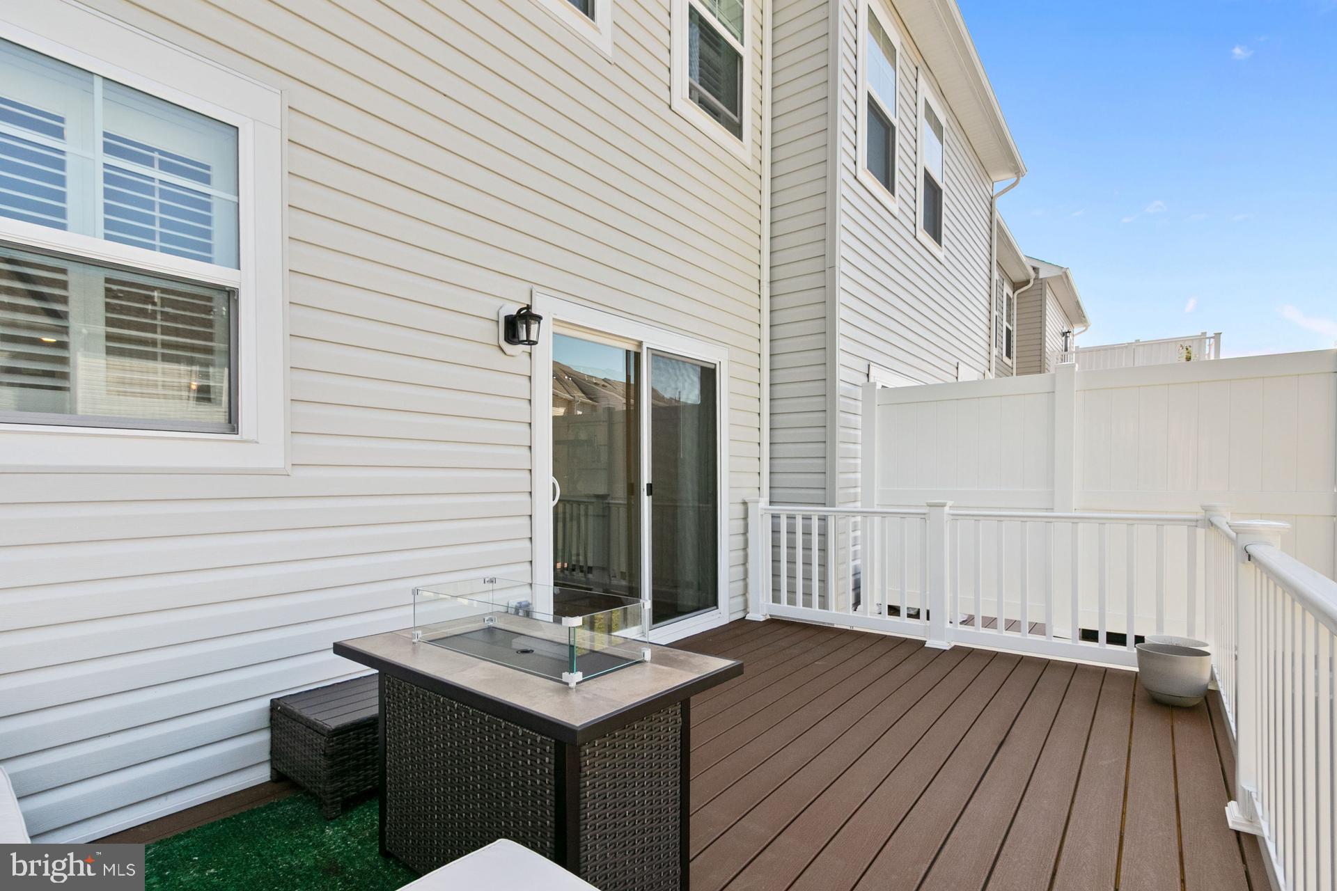 340 Shipyard Drive Cambridge, MD 21613 - Photo 16 of 35 a view of a deck with wooden fence