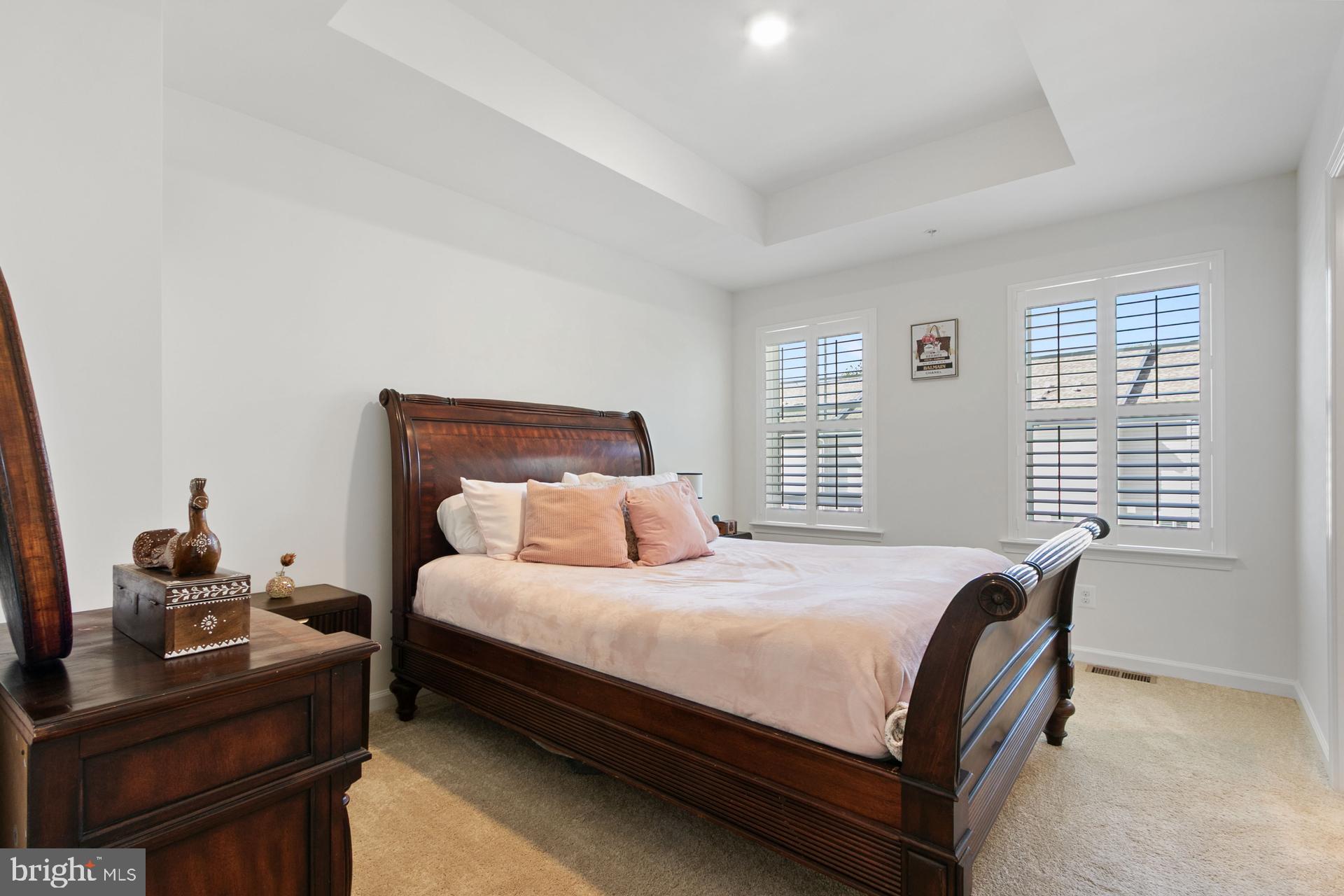 340 Shipyard Drive Cambridge, MD 21613 - Photo 24 of 35 a bedroom with a bed and a window