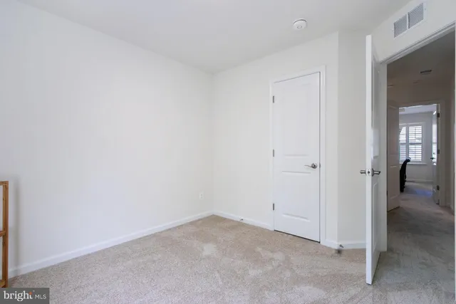 an empty room with closet