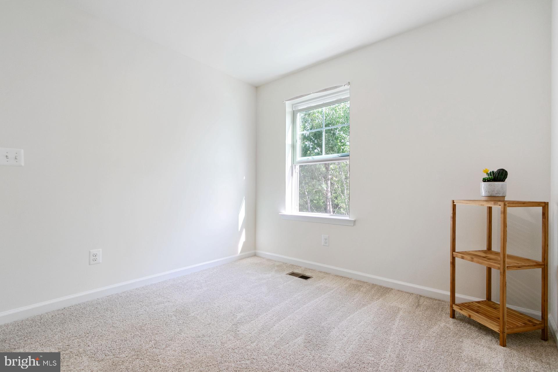 340 Shipyard Drive Cambridge, MD 21613 - Photo 30 of 35 an empty room with windows