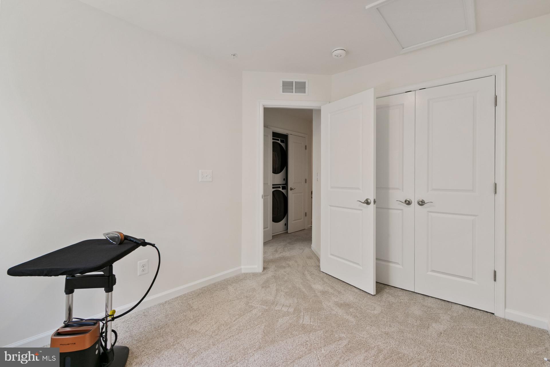 340 Shipyard Drive Cambridge, MD 21613 - Photo 33 of 35 a room with gym equipment and a window