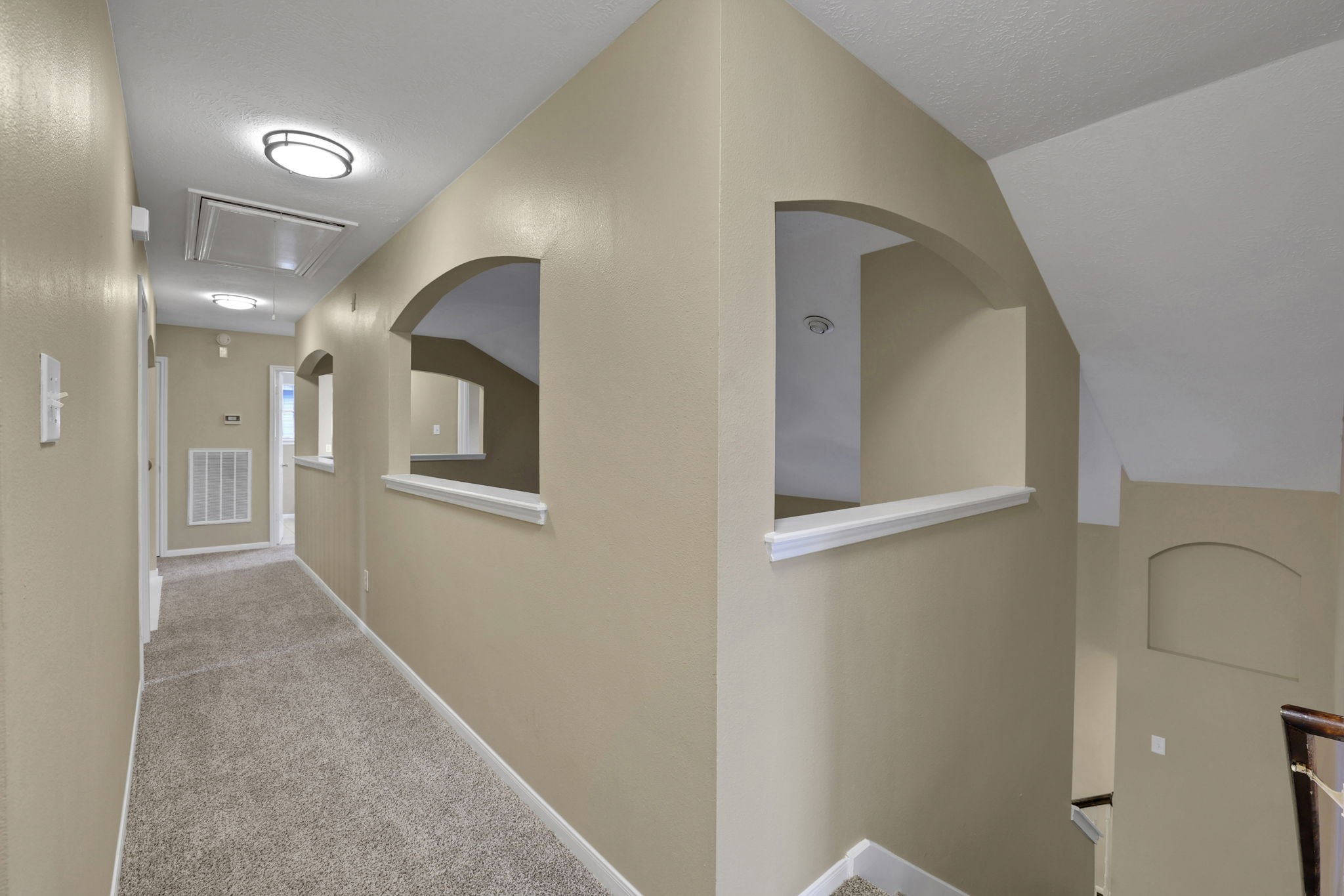 23207 Olive Ridge Court Katy, TX 77494 - Photo 27 of 46 a view of a hallway with windows