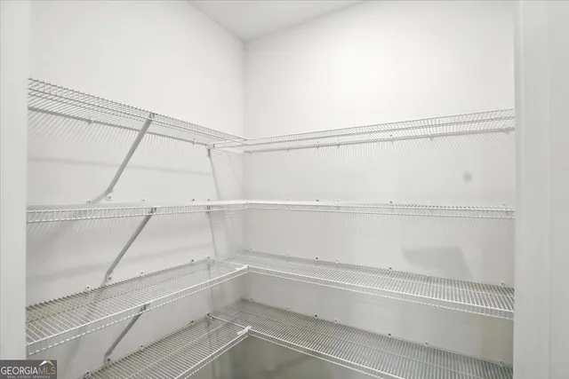 a empty closet with white paint
