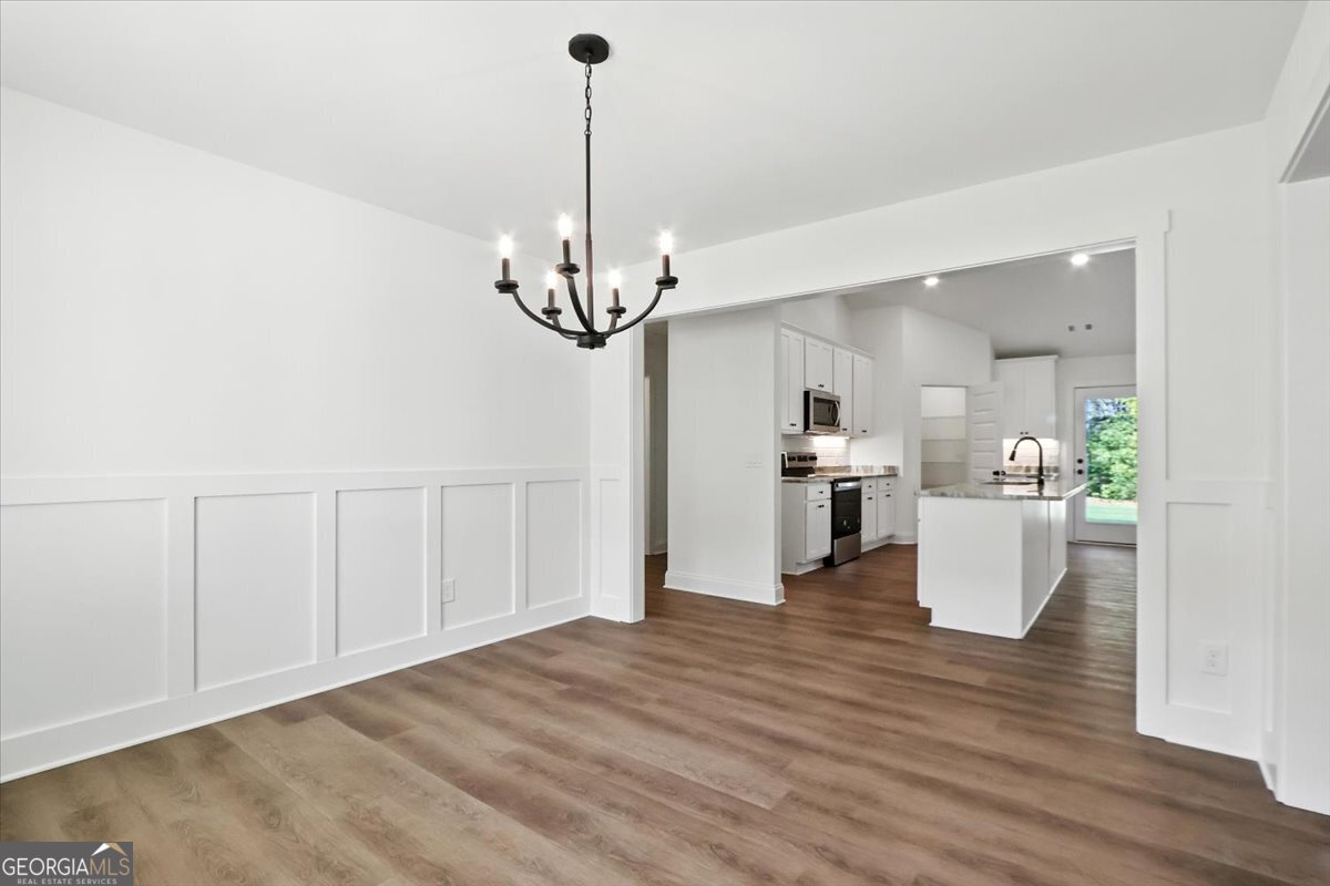 166 Rachel Lane Hartwell, GA 30643 - Photo 19 of 51 a view of a living room and kitchen with furniture