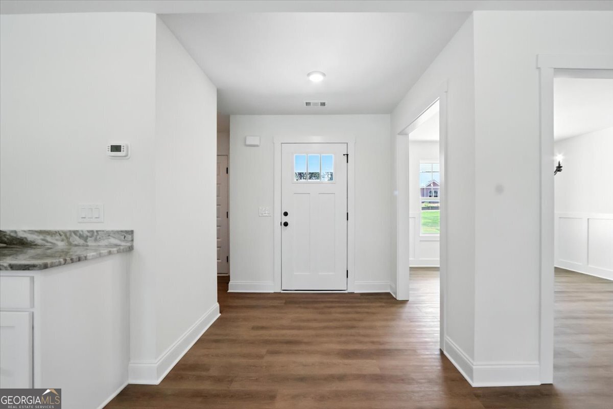 166 Rachel Lane Hartwell, GA 30643 - Photo 2 of 51 a view of a hallway with wooden floor