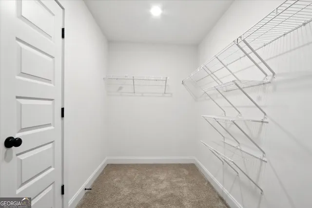 a view of a room with an empty space