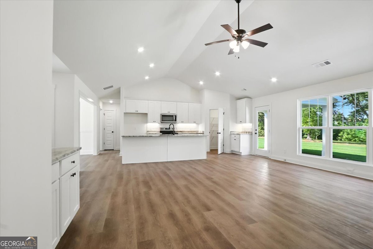 166 Rachel Lane Hartwell, GA 30643 - Photo 9 of 51 a view of kitchen with refrigerator and window