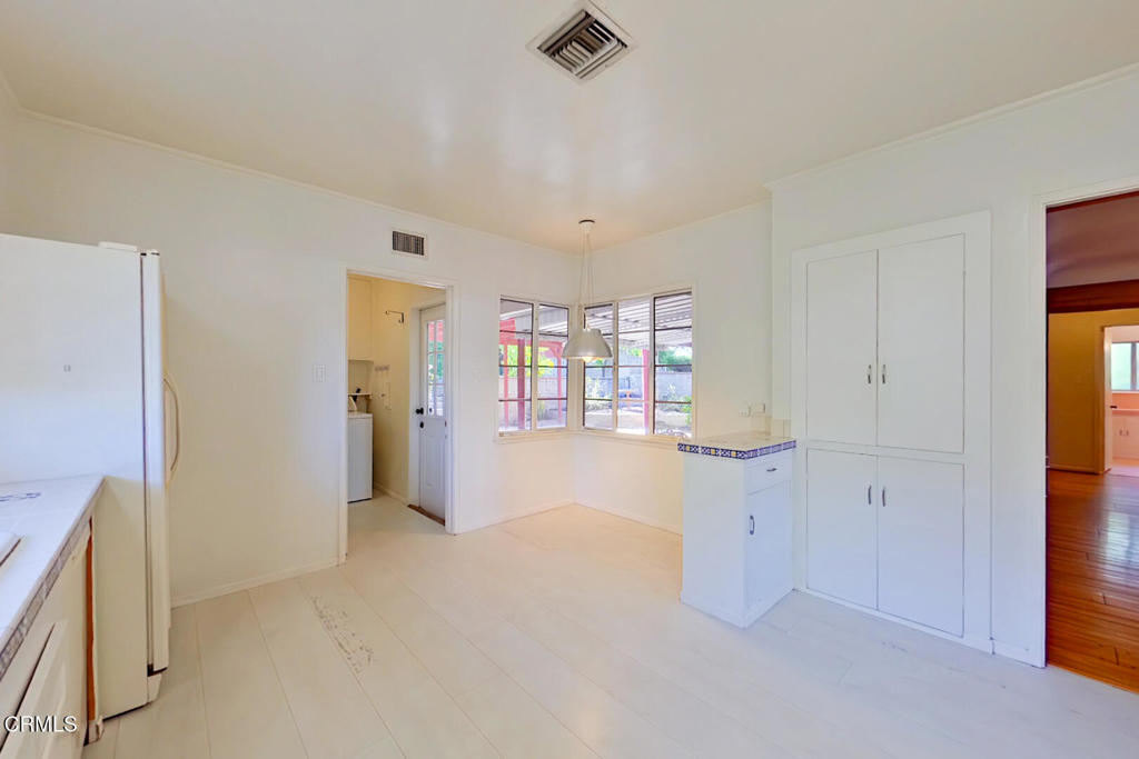 1462 Glengarry Road Pasadena, CA 91105 - Photo 15 of 57 wooden floor in an empty room with a window