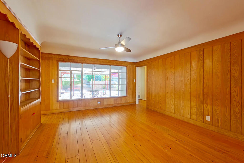 1462 Glengarry Road Pasadena, CA 91105 - Photo 18 of 57 a view of an empty room with a window and wooden floor