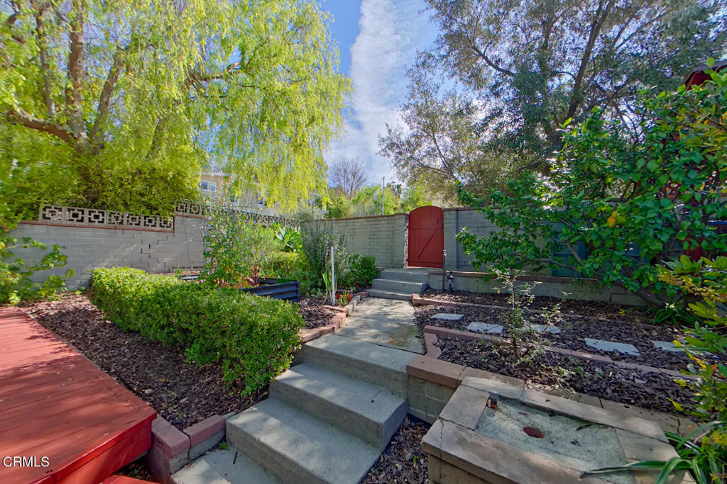 1462 Glengarry Road Pasadena, CA 91105 - Photo 49 of 57 a garden view with a seating space