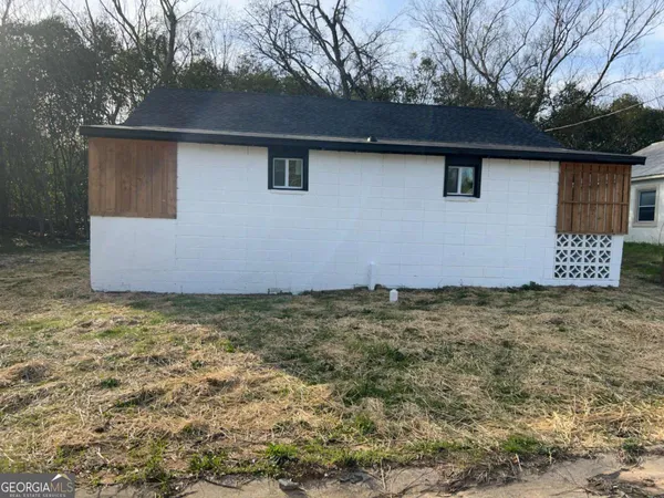 a view of backyard of house