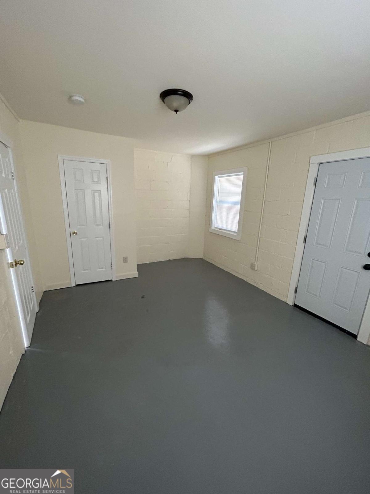3441 Antioch Heights Macon, GA 31206 - Photo 3 of 11 an empty room with a window