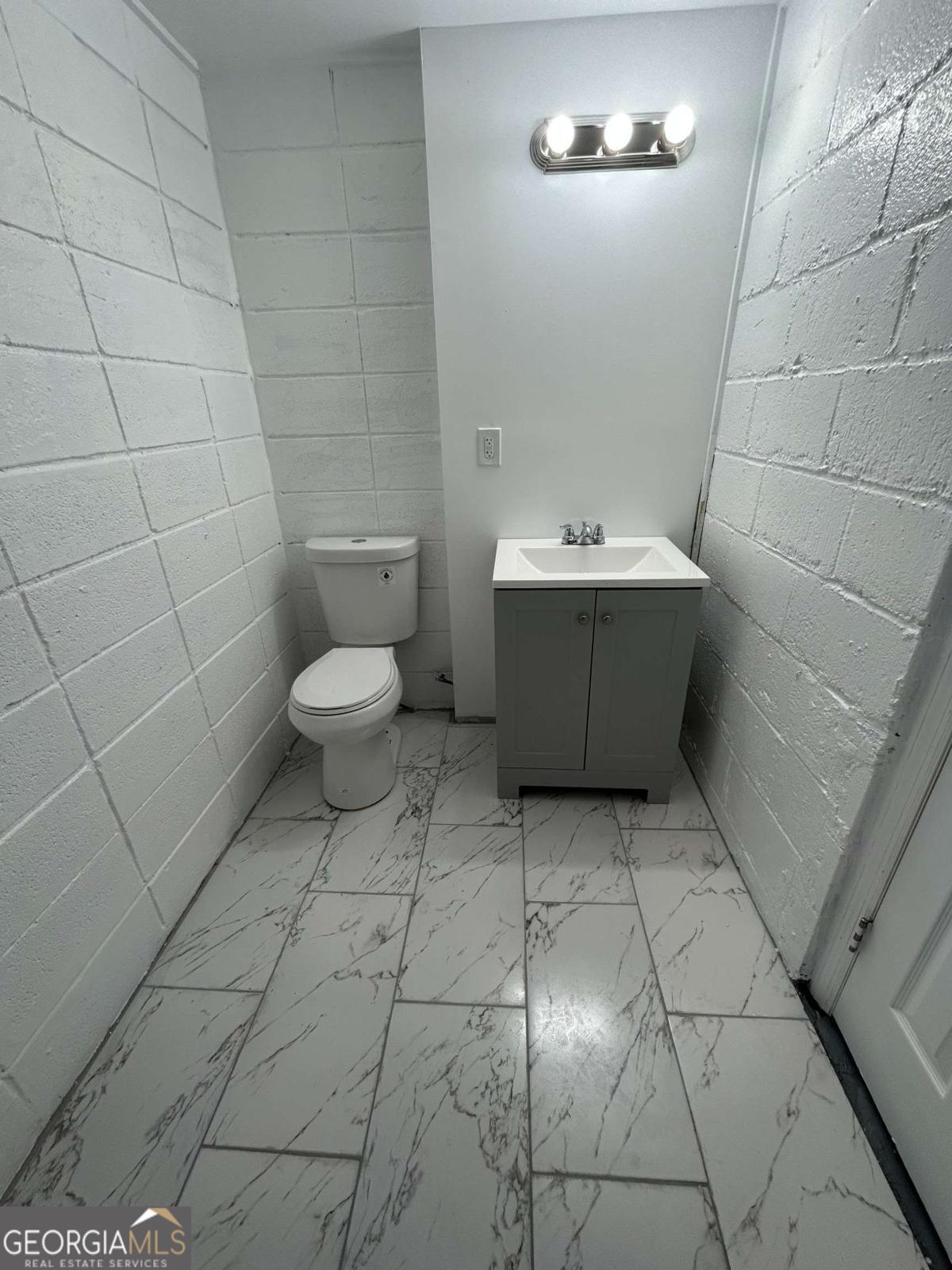 3441 Antioch Heights Macon, GA 31206 - Photo 6 of 11 a bathroom with a sink and a toilet