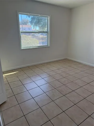 a view of a room and window