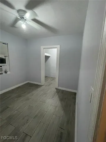 an empty room with a bathroom