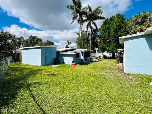 a view of a backyard with a garden