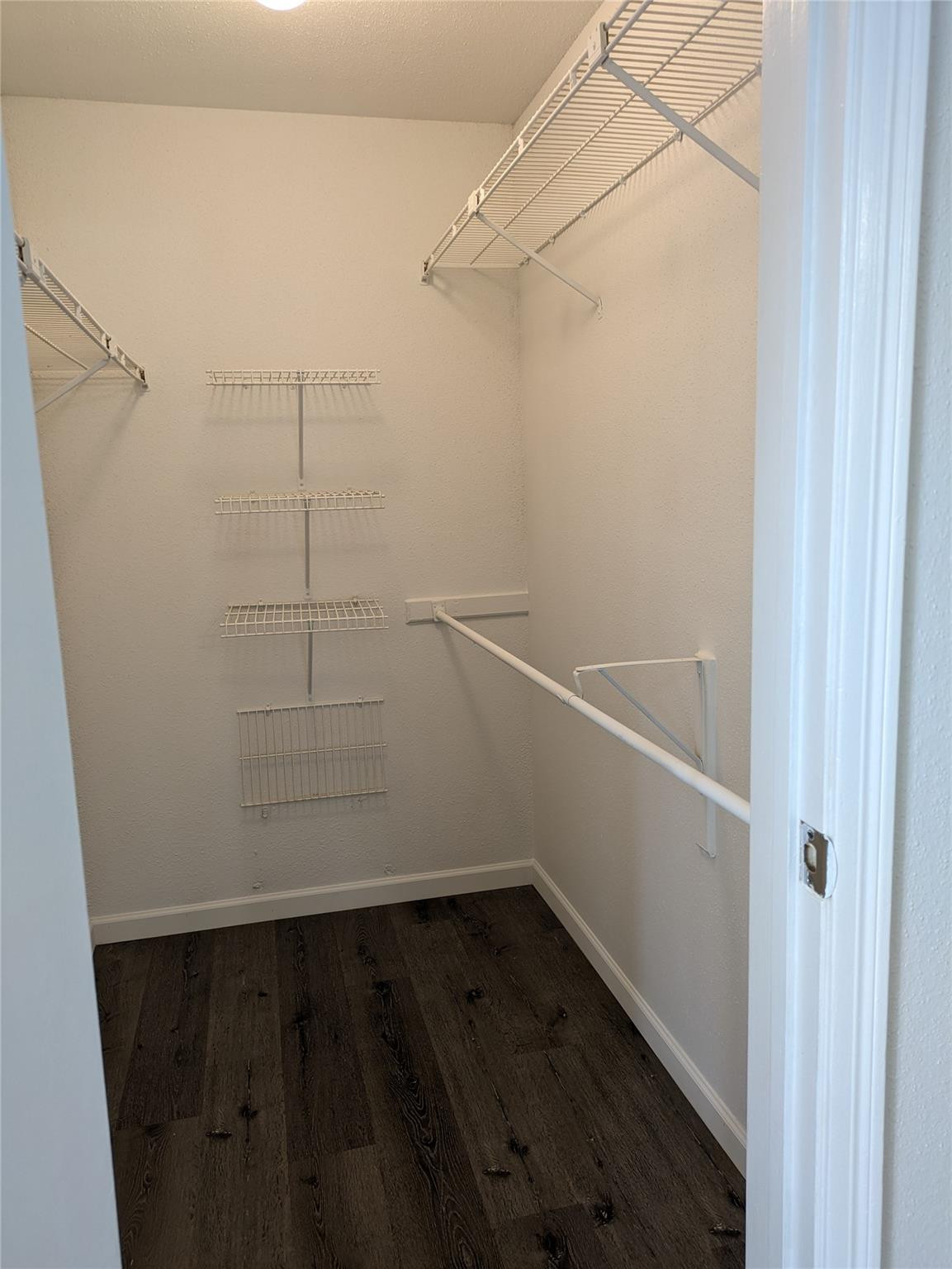949 Riverside Drive, Unit 411 Coral Springs, FL 33071 - Photo 8 of 15 a view of small space with racks on the wall