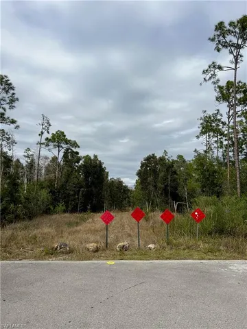 a view of road and houses