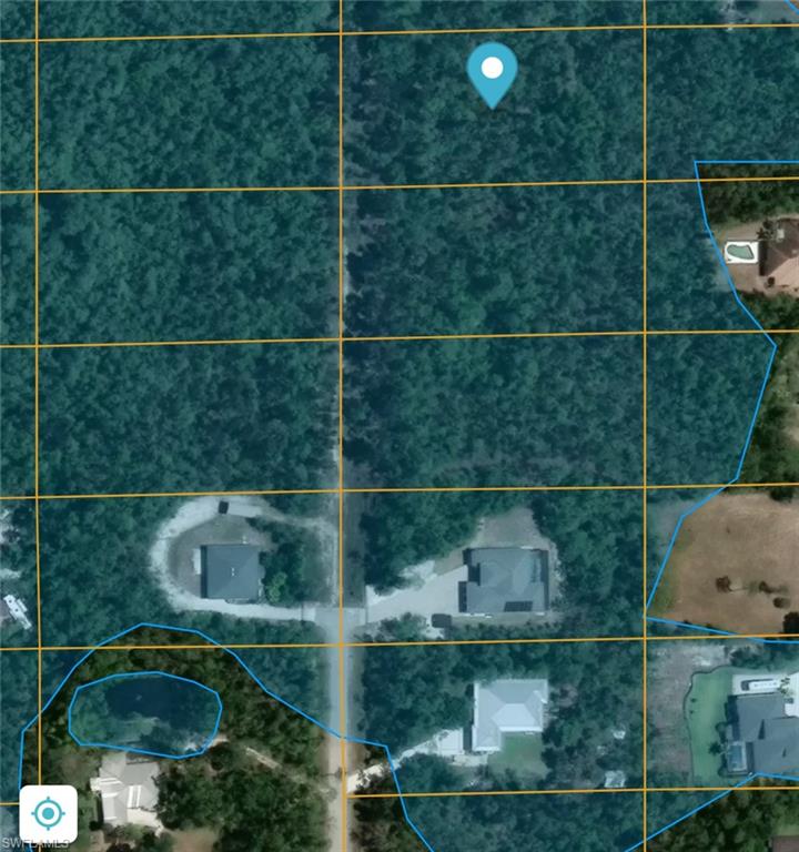 24265 Rocky Road Bonita Springs, FL 34135 - Photo 4 of 5 a bathroom with a shower and toilet