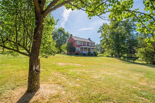 a view of an ocean with a house