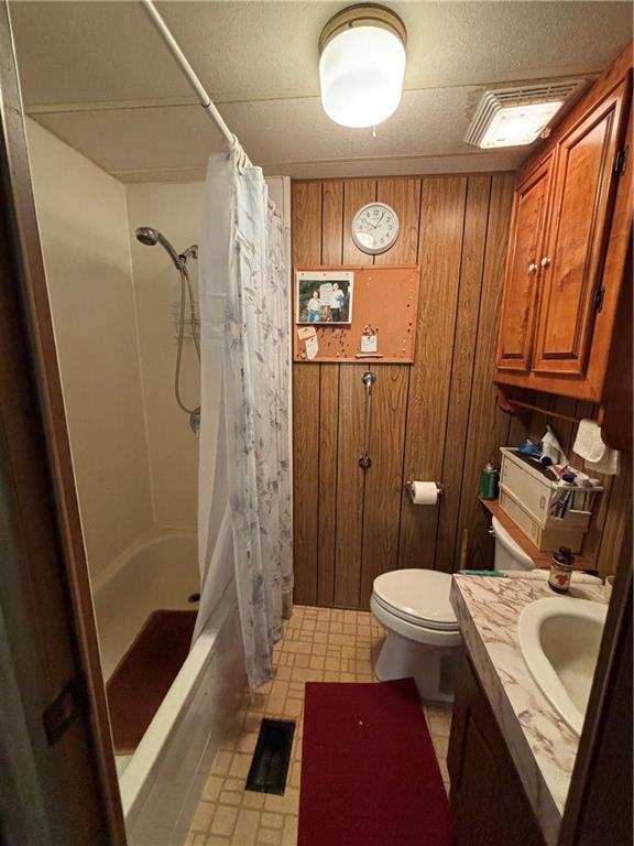 2113 Sebring Road Marion Center, PA 15759 - Photo 7 of 9 a bathroom with a sink a toilet and shower