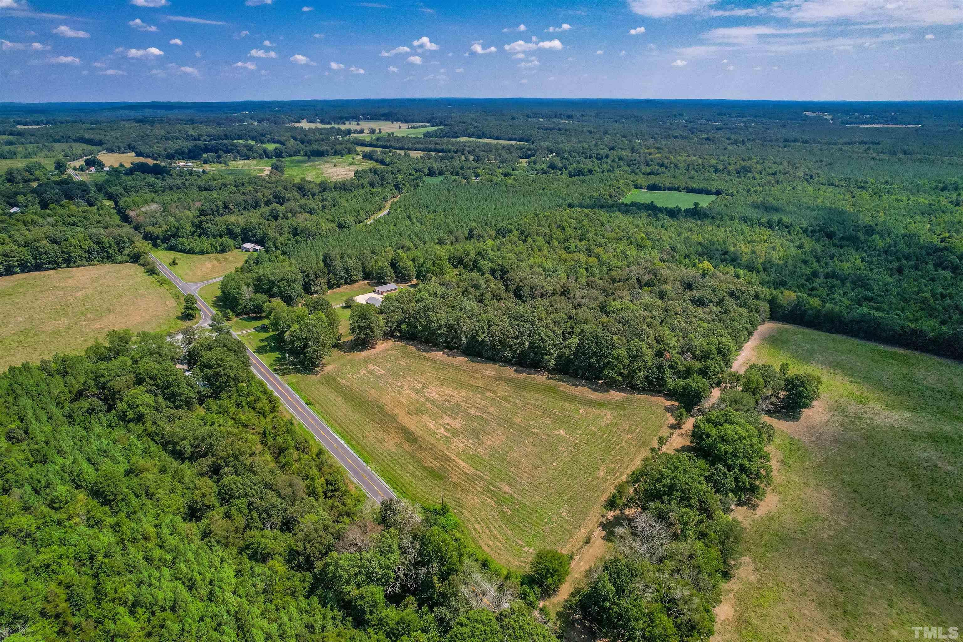 0 Bennett Siler City Road Bennett, NC 27208 - Photo 3 of 12 an aerial view of a houses with a yard