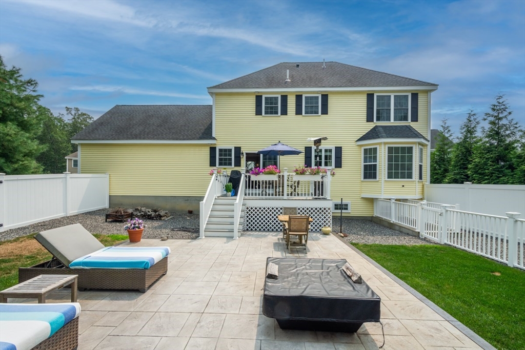 4 Rhodes Drive, Unit 4 Berlin, MA 01503 - Photo 30 of 30 a front view of a house with swimming pool