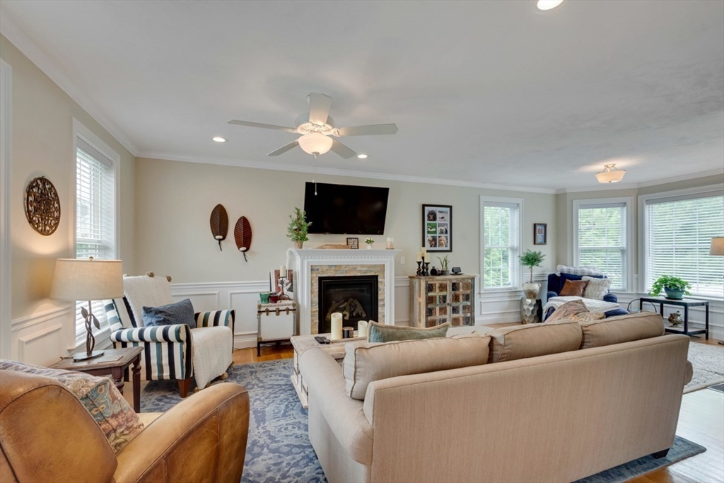 4 Rhodes Drive, Unit 4 Berlin, MA 01503 - Photo 5 of 30 a living room with furniture fireplace and window