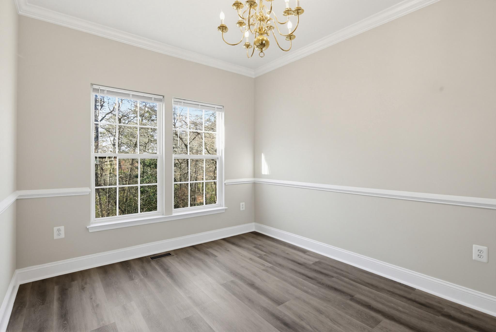 14603 Farnham Lane Laurel, MD 20707 - Photo 11 of 51 Dining room w/ chair rail & crown molding