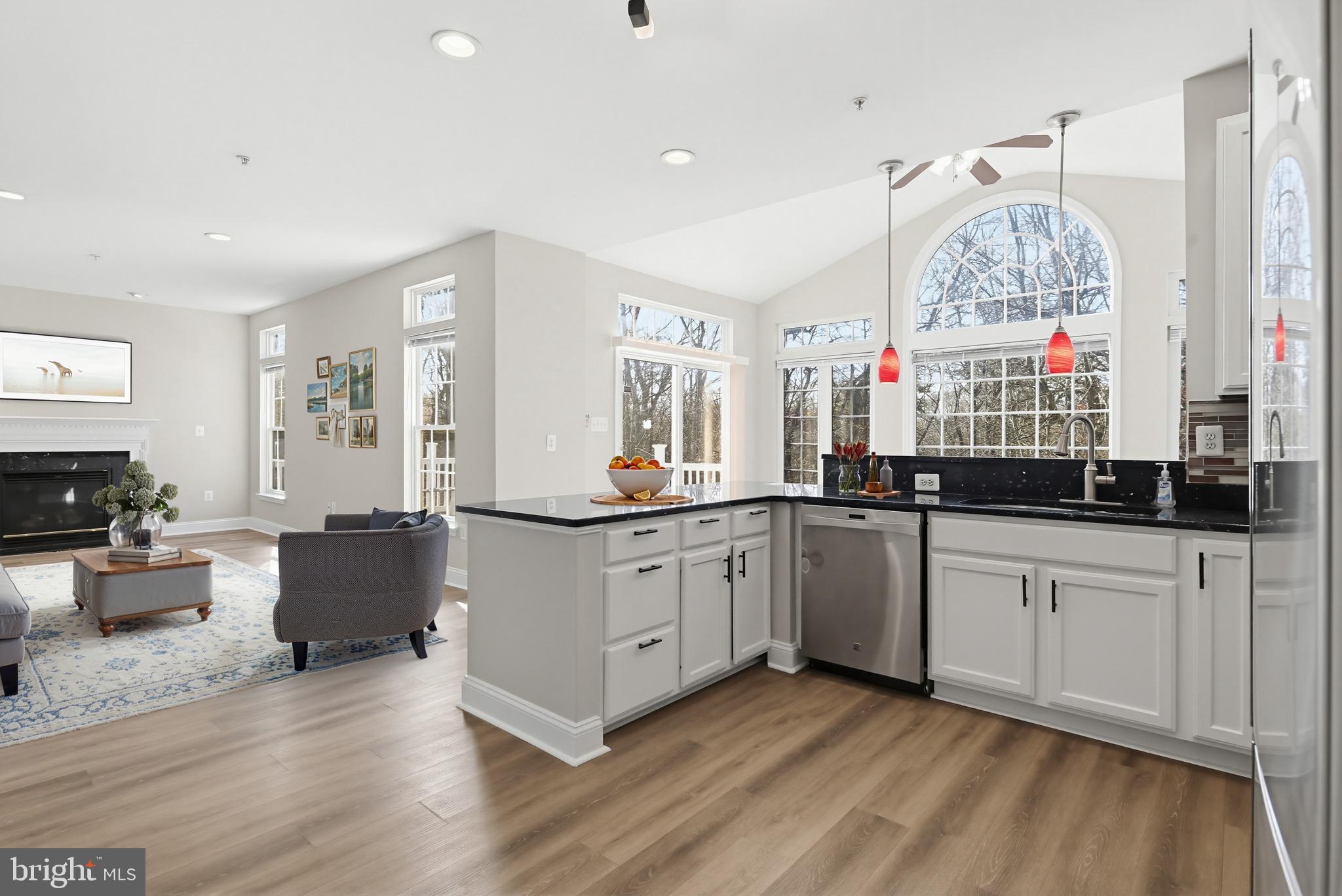 14603 Farnham Lane Laurel, MD 20707 - Photo 15 of 51 Virtually Staged- Kitchen Into Family Room