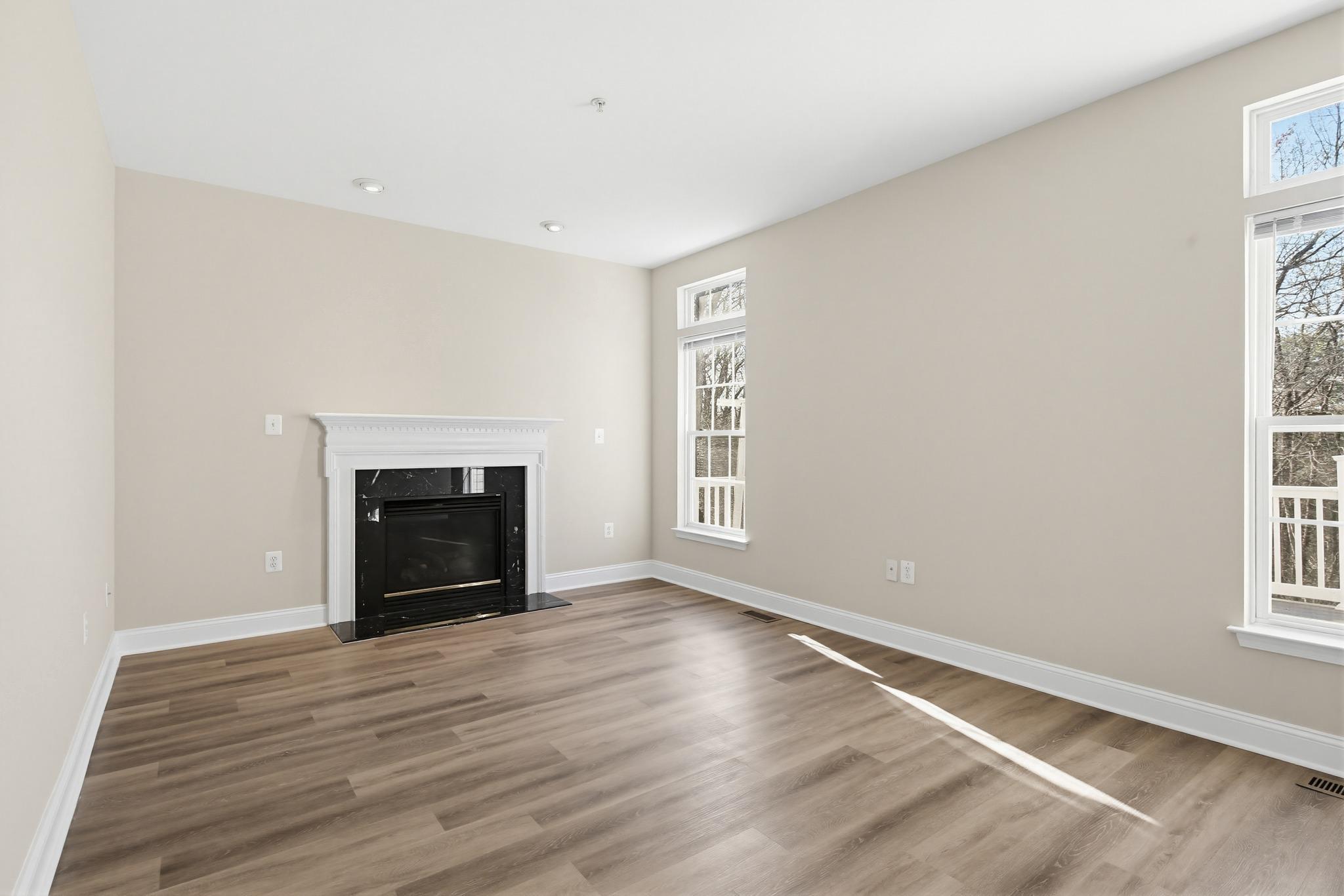 14603 Farnham Lane Laurel, MD 20707 - Photo 21 of 51 Family room with gas fireplace
