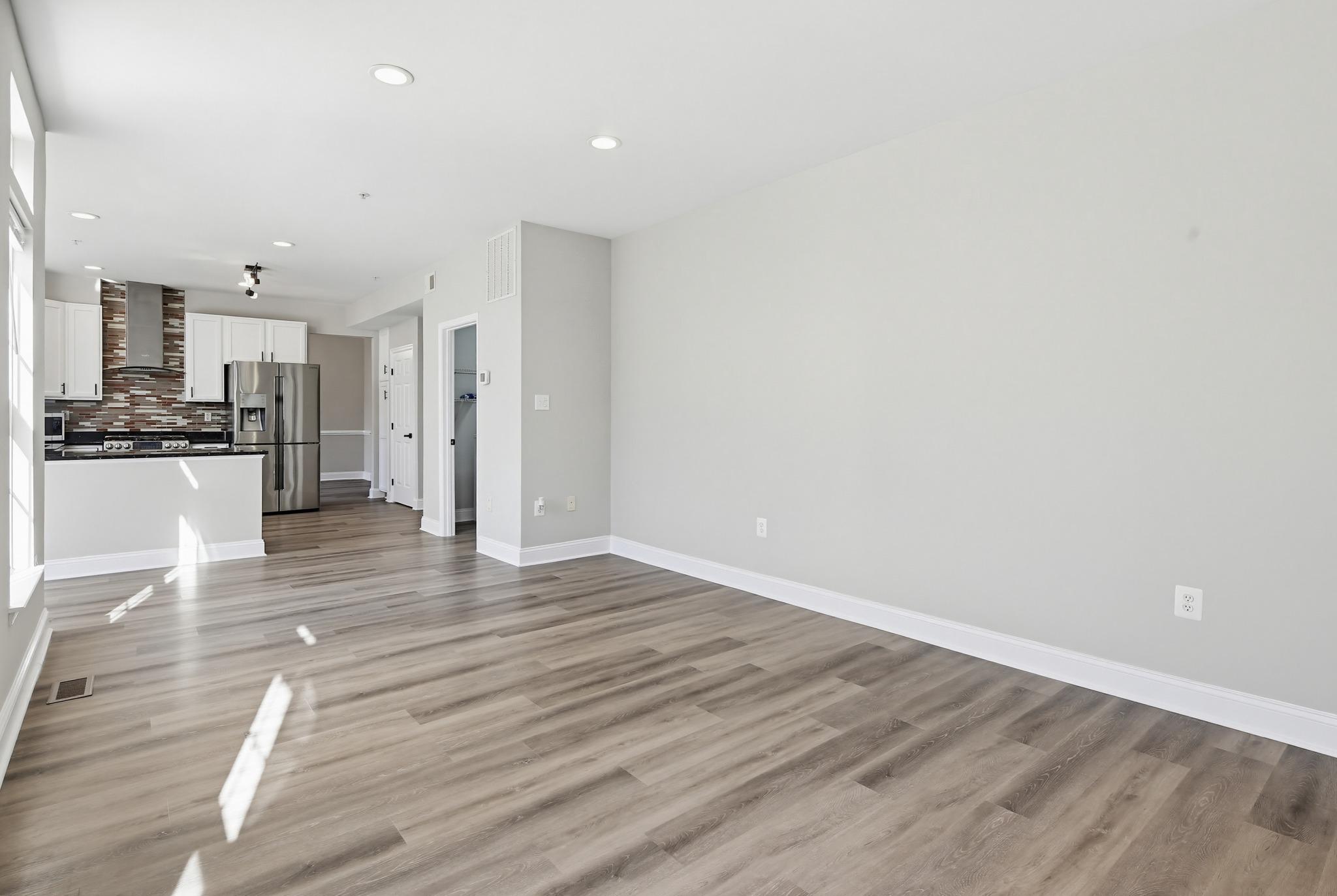14603 Farnham Lane Laurel, MD 20707 - Photo 22 of 51 Spacious family room - your next movie night here!